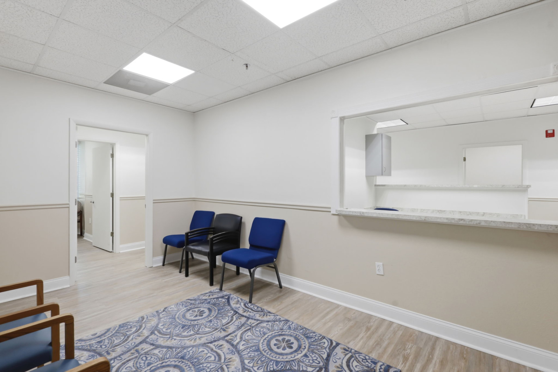 Medical office waiting room with reception window