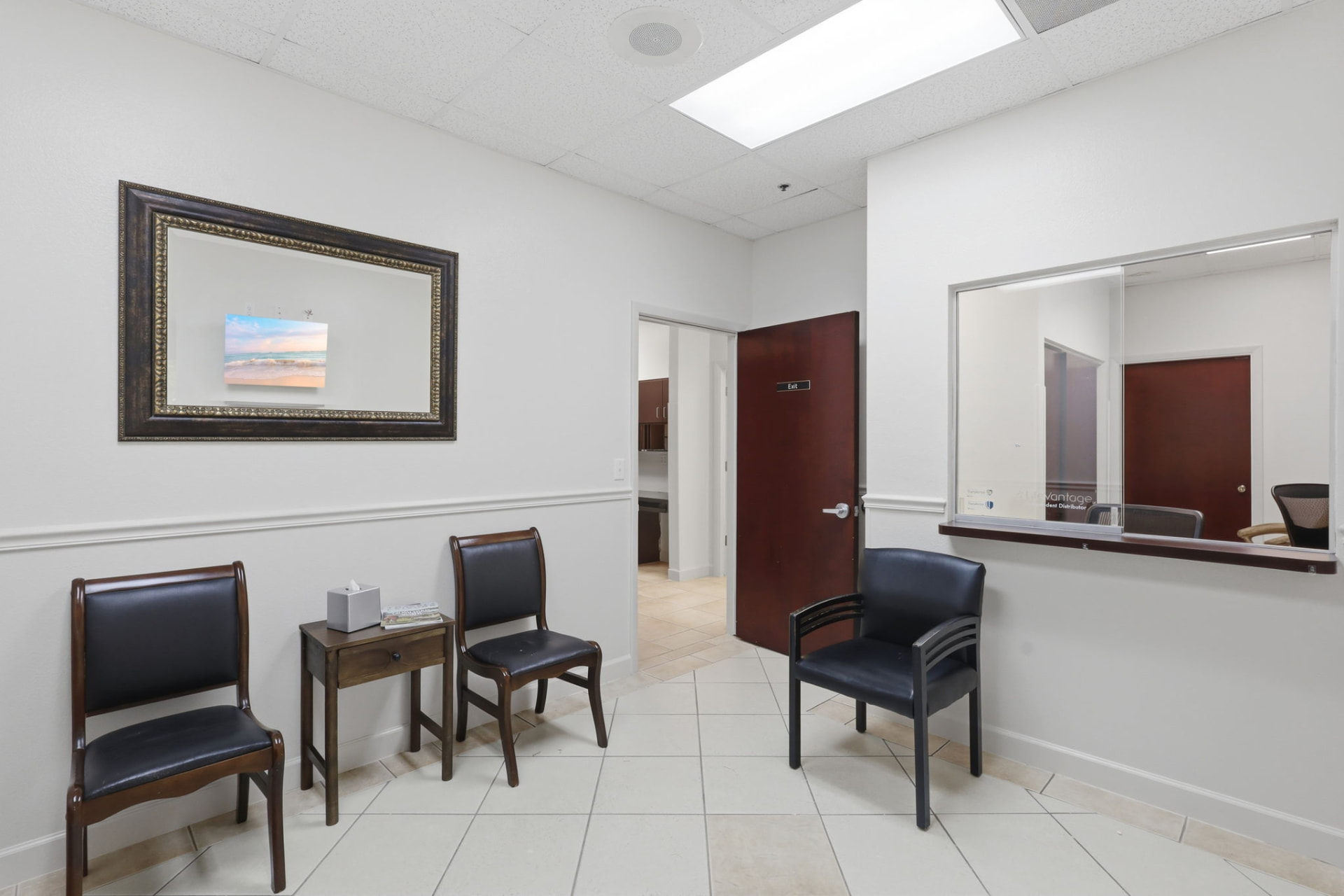 Office lobby with seating and check-in window