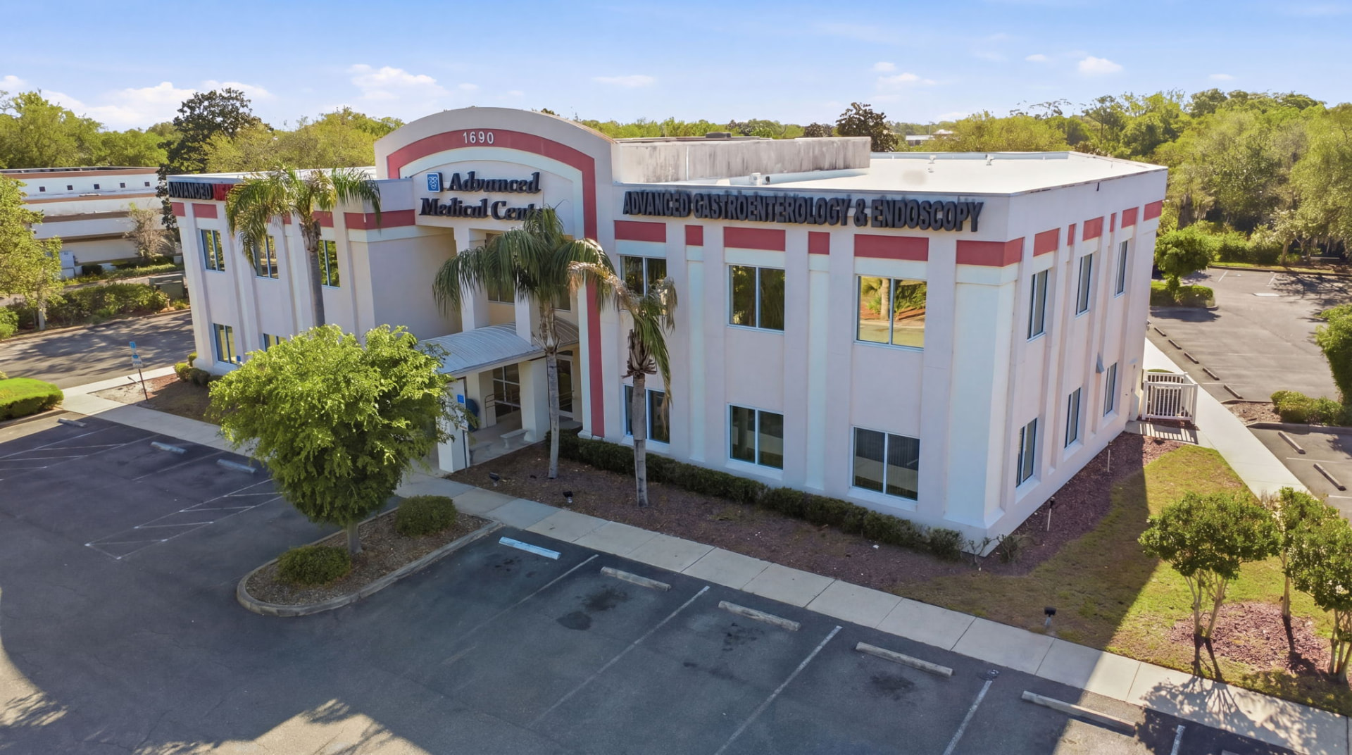 Aerial view of a two-story medical office building and parking lot