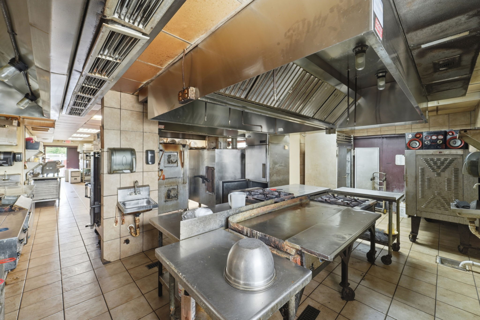 Commercial kitchen interior with stainless steel equipment